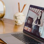 Portrait of yoga instructor Svitlana Gumenyuk smiling.